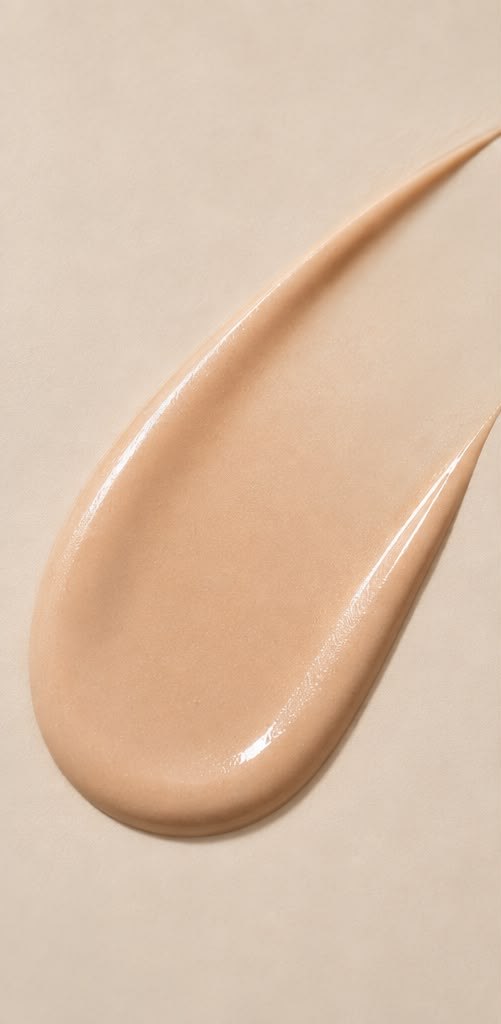 A swatch of the BB cream: a fluid, glossy beige stroke